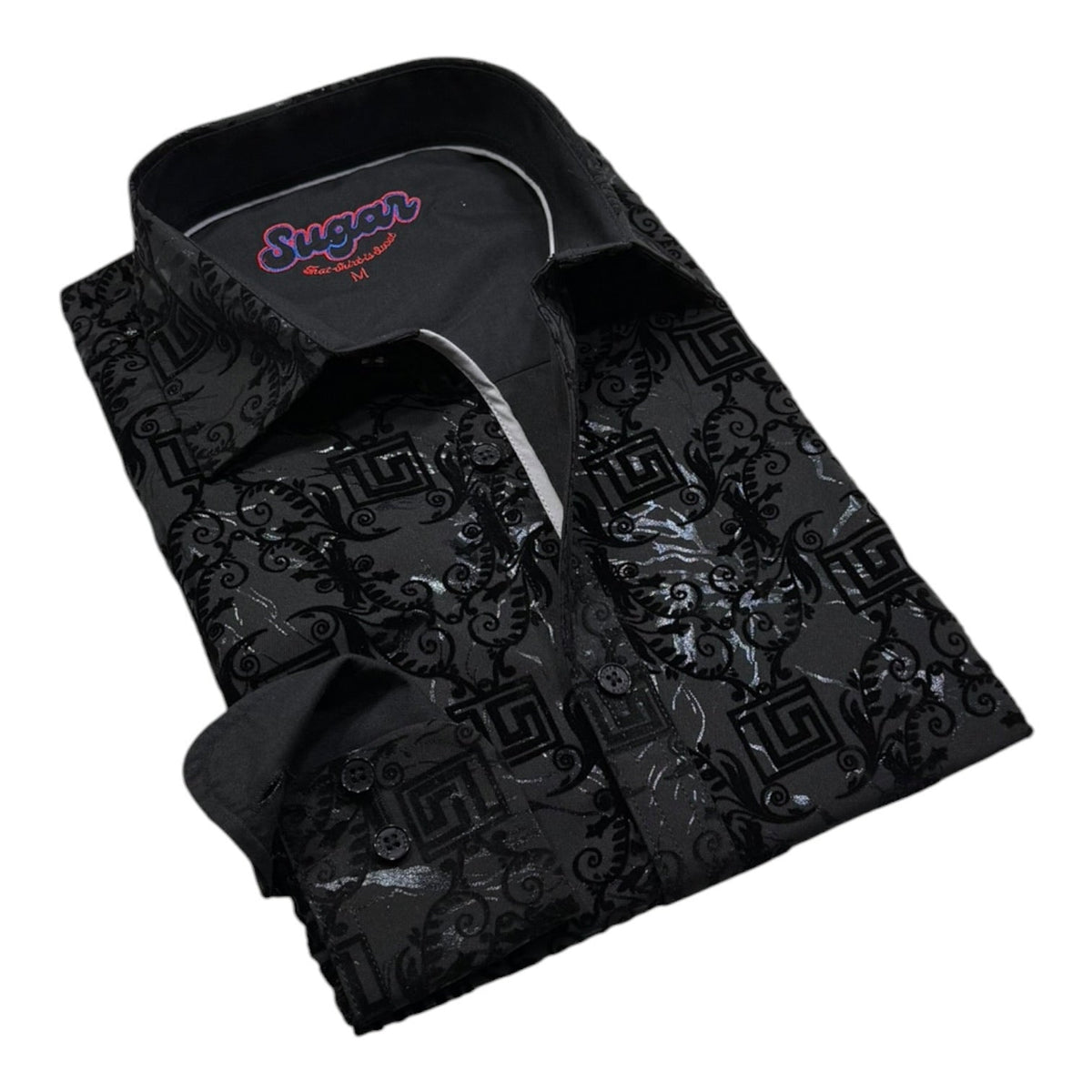 Folded black long-sleeve button-up shirt with glossy floral and geometric pattern
